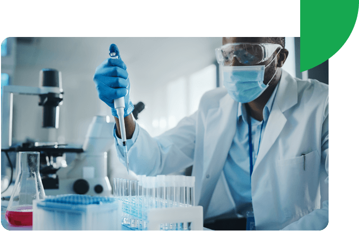 Scientist placing vaccine in vials